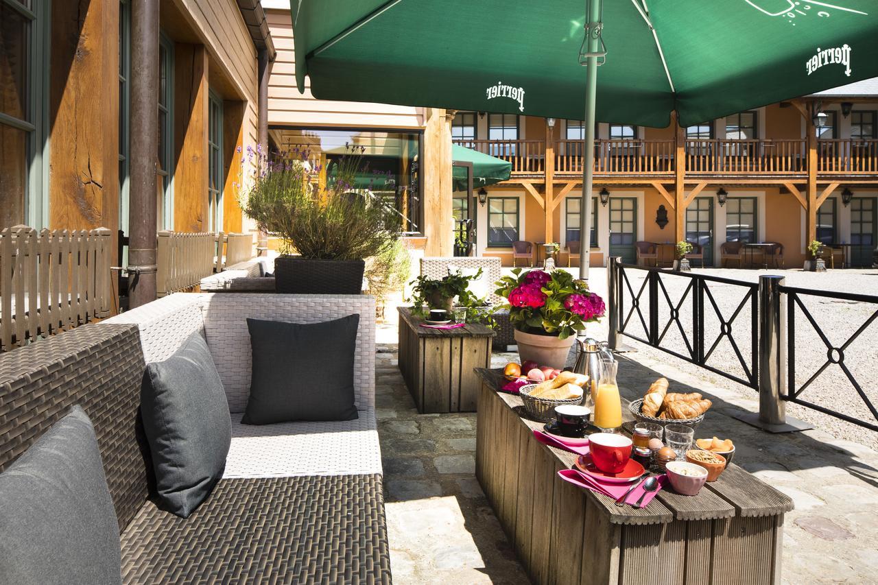 Hotel Et Spa Le Lion D'Or Pont-Évêque Екстериор снимка